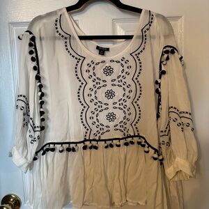 Black and white blouse with Pom Poms